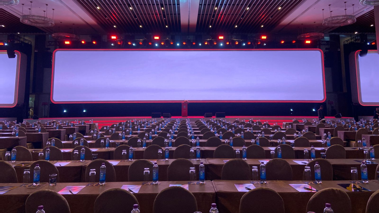 JAC Powered Momentum conference stage with a full-width continuous LED wall